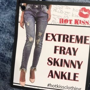 Frayed hem acid wash jeans